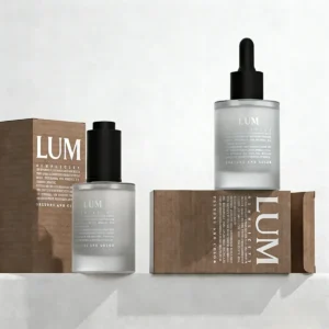 Turnkey facial serum packaging manufactured by Lumlun, featuring the LUM logo on a frosted bottle and matching paper box.