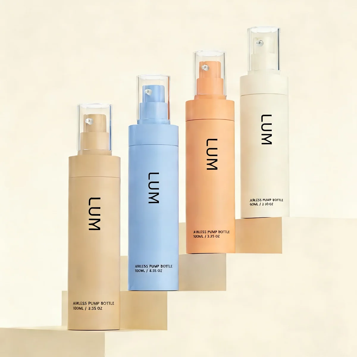 A minimalist setup of cosmetic bottles with clean lines and a matte white finish.