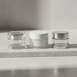 Guide Cover: A variety of cream jars (Single Wall, Double Wall, different materials) arranged on a minimalist surface.