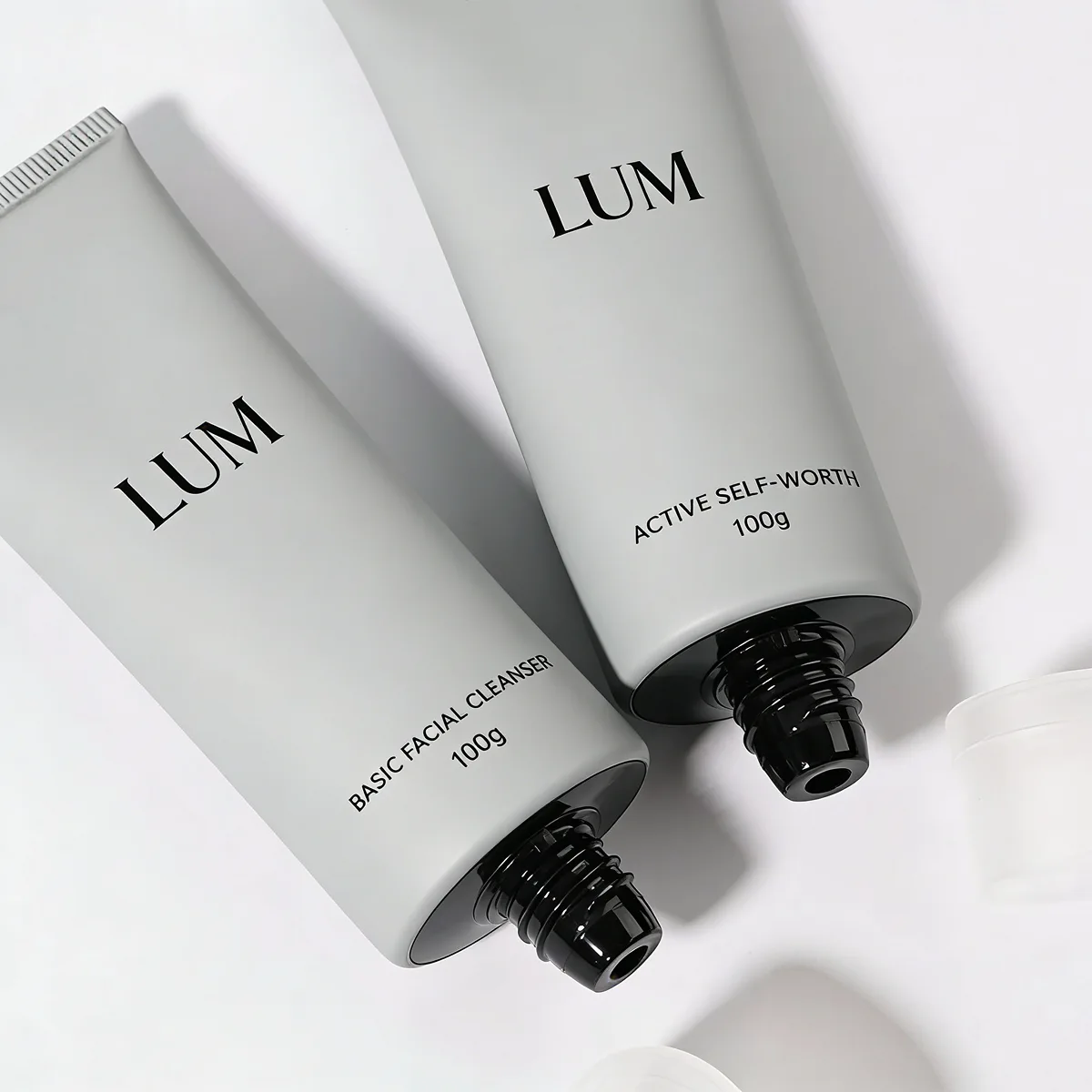 100ml flattened ergonomic squeeze containers perfectly sized for daily facial cleansers and body exfoliant gels.