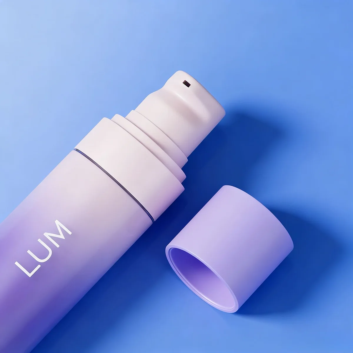 Luxury skincare packaging manufactured by Lumlun, featuring the LUM logo on a premium frosted gradient glass body.