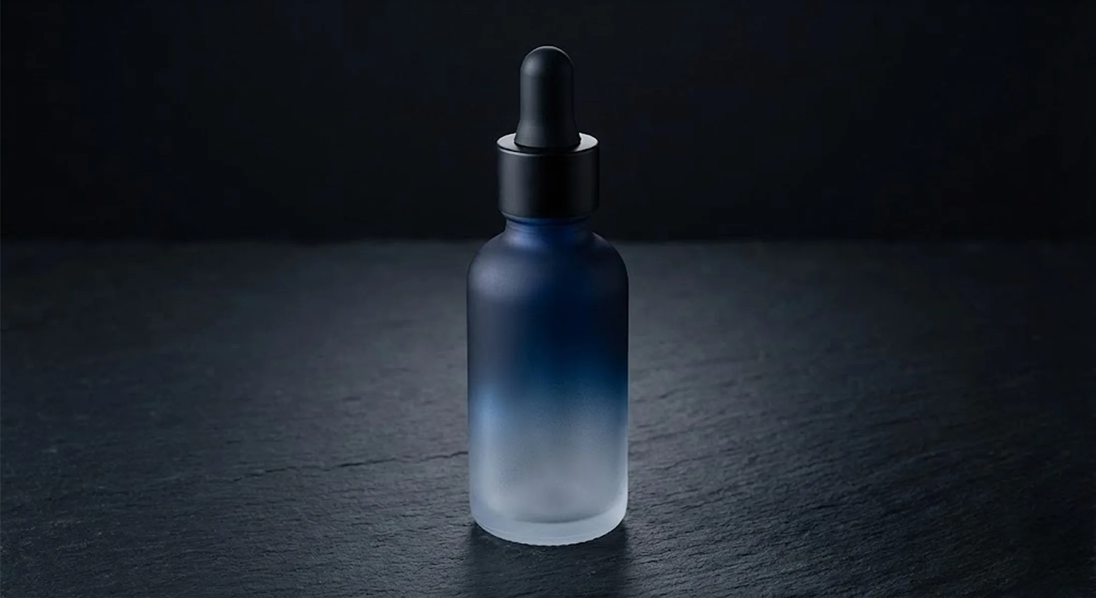 Custom UV coated gradient glass dropper bottle for essential oil protection