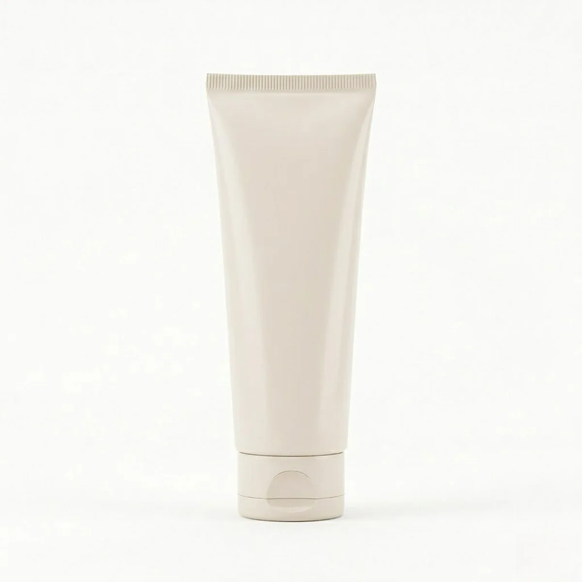 Beige cosmetic tube with a brilliant glossy UV coating for enhanced color vibrancy.