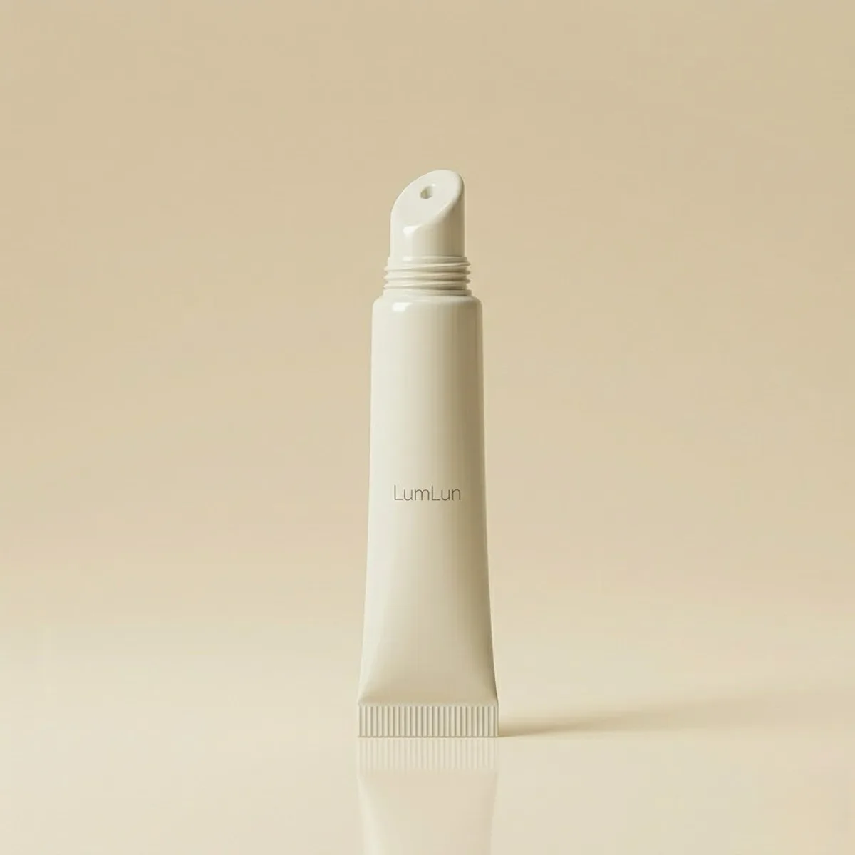 Small squeeze tube with a slant-tip applicator from a custom lip gloss tubes manufacturer.
