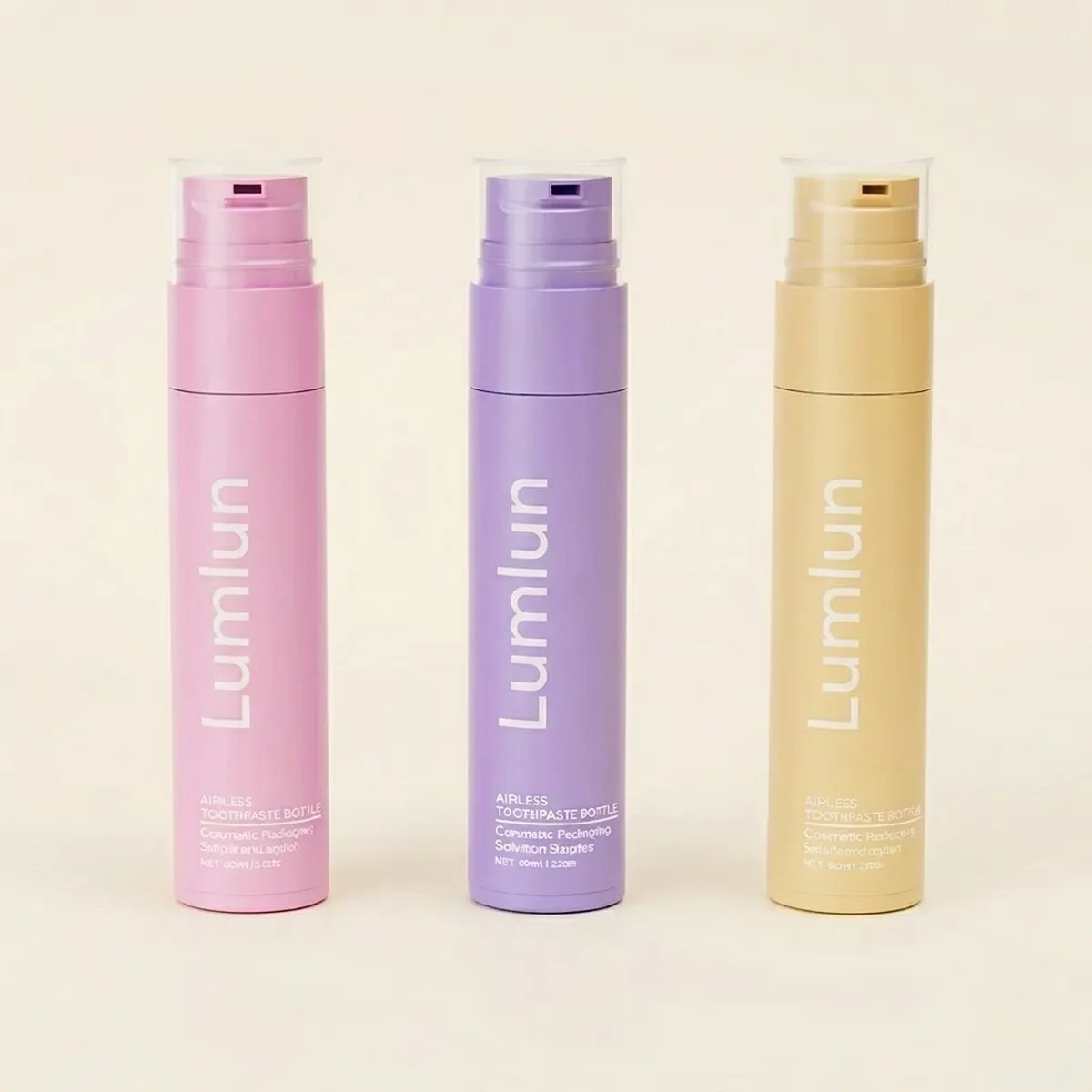 Pink, purple, and yellow LumLun Toothpaste Airless Pump Bottles for oral care formulas