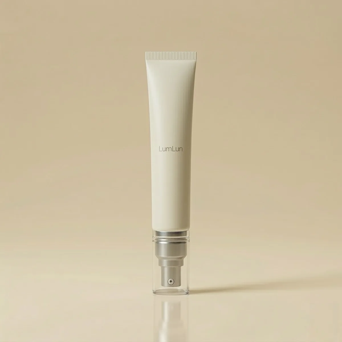 White cosmetic tube with an airless pump head for vacuum-based dispensing.
