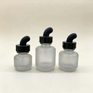 Collection of 15ml 30ml 50ml glass serum bottles with angled dropper teats
