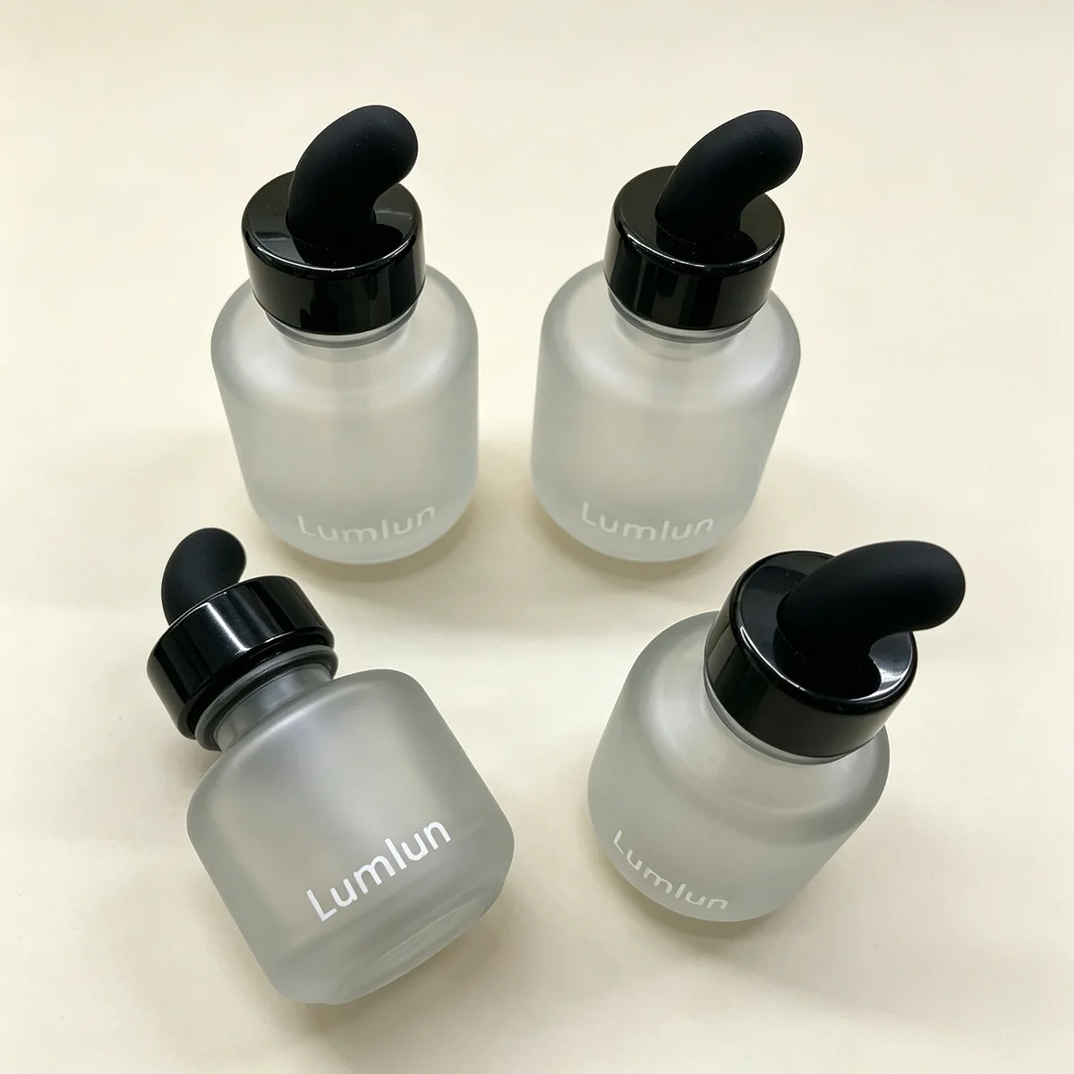Custom branded frosted glass dropper bottles for premium skincare serums