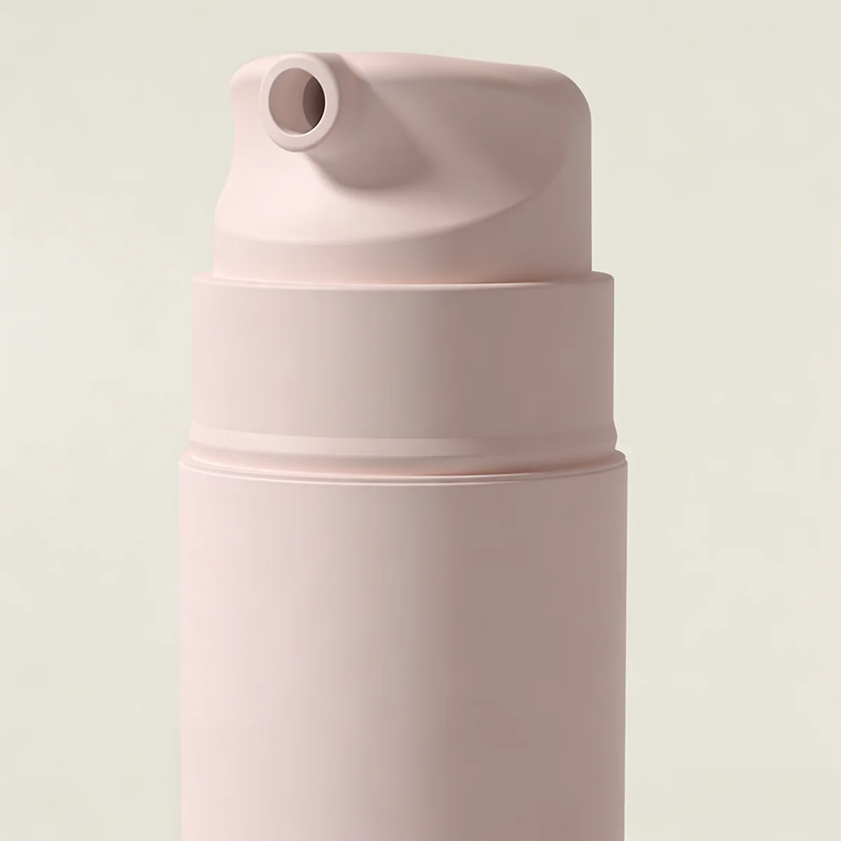 Close-up of the precise 2.5cc high-volume airless pump head, designed for smooth dispensing of high-viscosity pastes