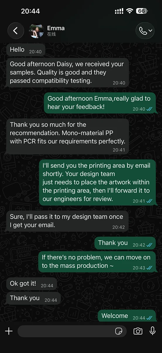 WhatsApp conversation with Emma, natural beauty brand sustainability lead from Netherlands, confirming LumLun airless bottle samples passed compatibility testing and that mono-material PP with PCR solution meets their EU recyclability requirements — moving to print area review stage. LumLun OEM client testimonial.