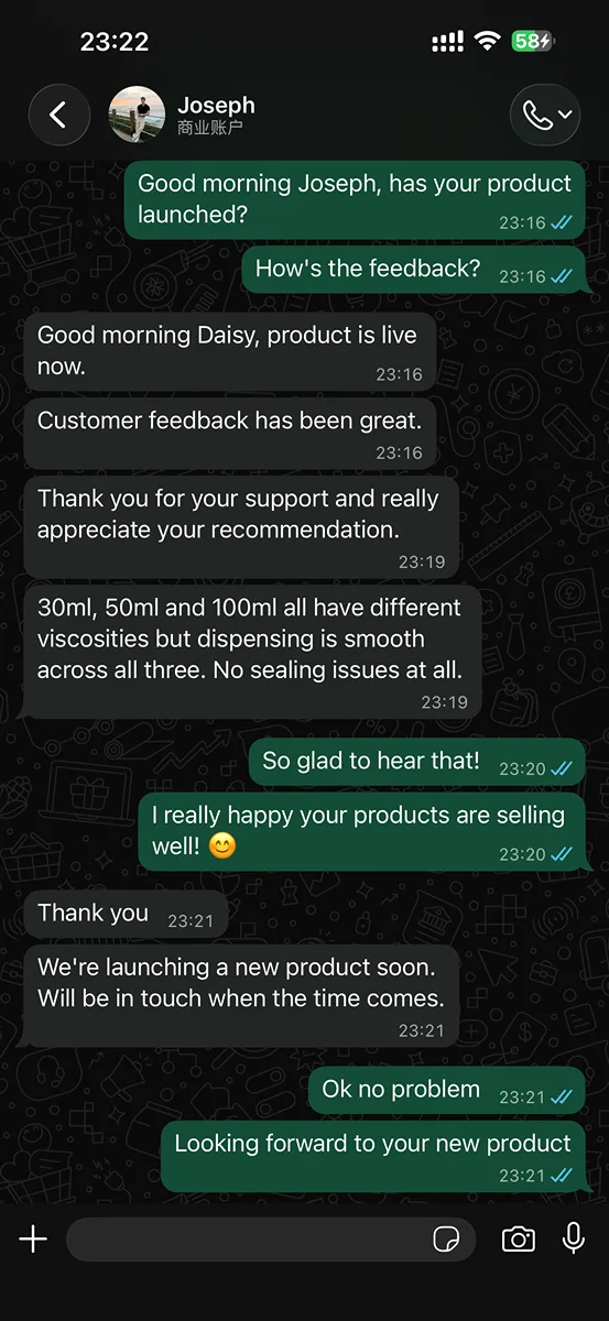 WhatsApp conversation with Joseph, premium skincare line operations manager from United Kingdom, confirming successful product launch with positive customer feedback across 30ml, 50ml and 100ml airless bottles in three viscosities — all dispensing smoothly with no sealing issues. LumLun OEM client testimonial.