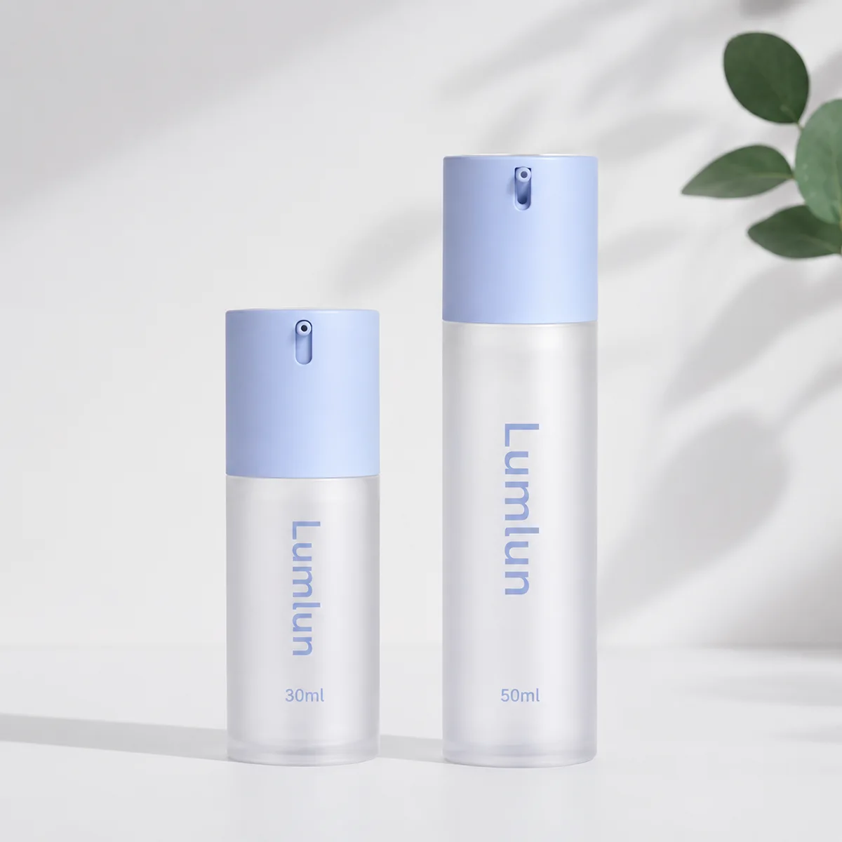 Custom frosted MS airless pump bottle 30ml and 50ml side by side with twist lock cap