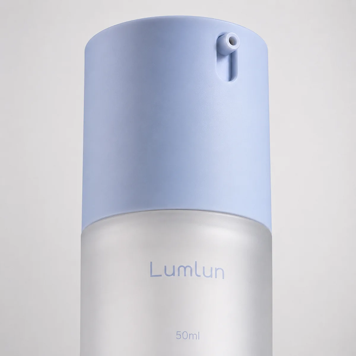 Frosted MS twist lock airless pump bottle 50ml close-up showing rotary cap and nozzle detail