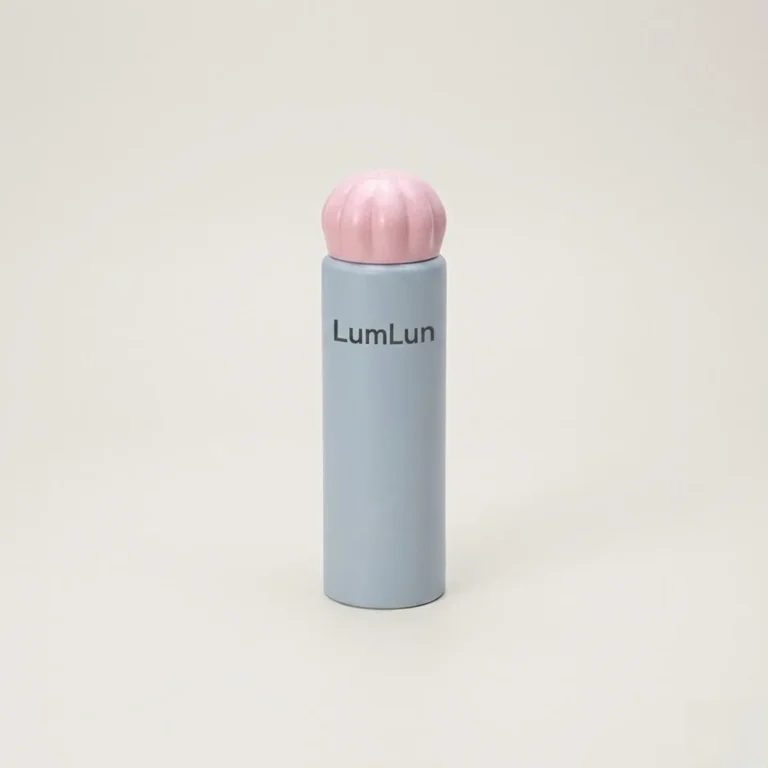 Matte blue-grey 35mm PE cosmetic squeeze tube with pink cloud dome screw cap fully closed, upright standing view, LumLun OEM custom cosmetic tube for body care and hair care packaging