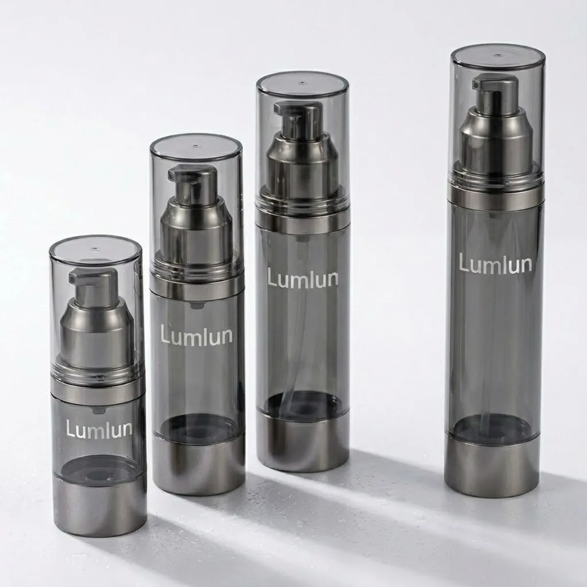 OEM clear vacuum pump bottle featuring metallic collar and piston mechanism