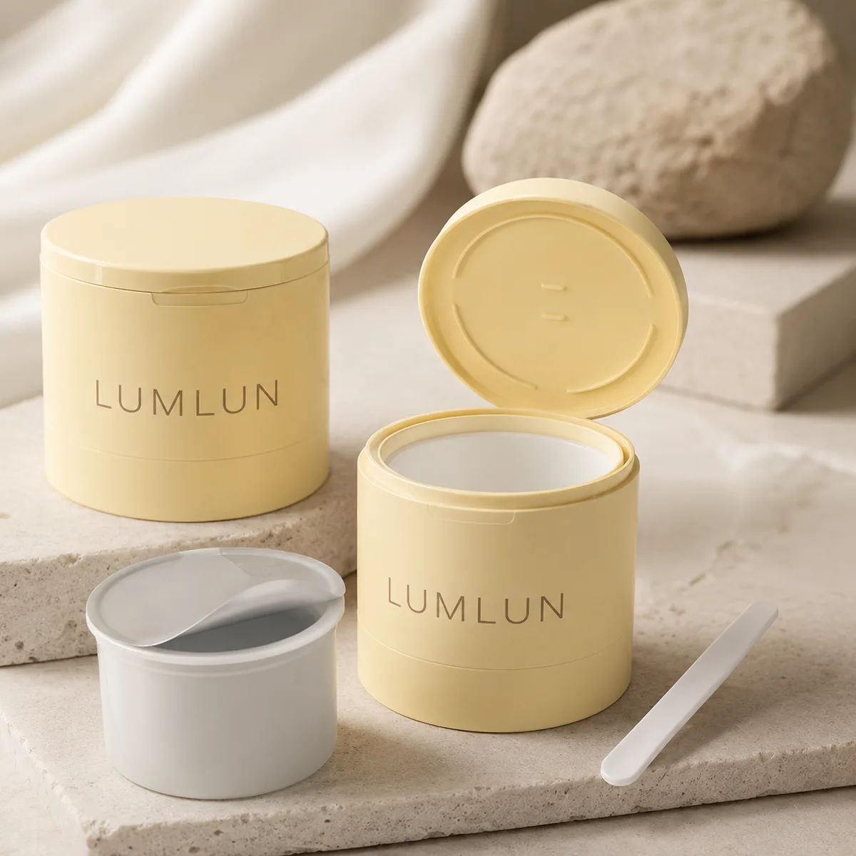 Refillable PP cream jar showing replaceable inner cup removed from outer shell with spatula