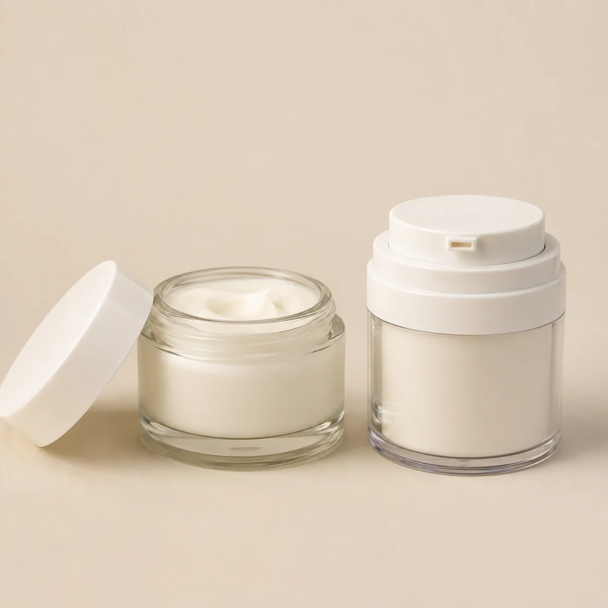Traditional open screw-lid cream jar next to a modern airless pump jar for skincare comparison