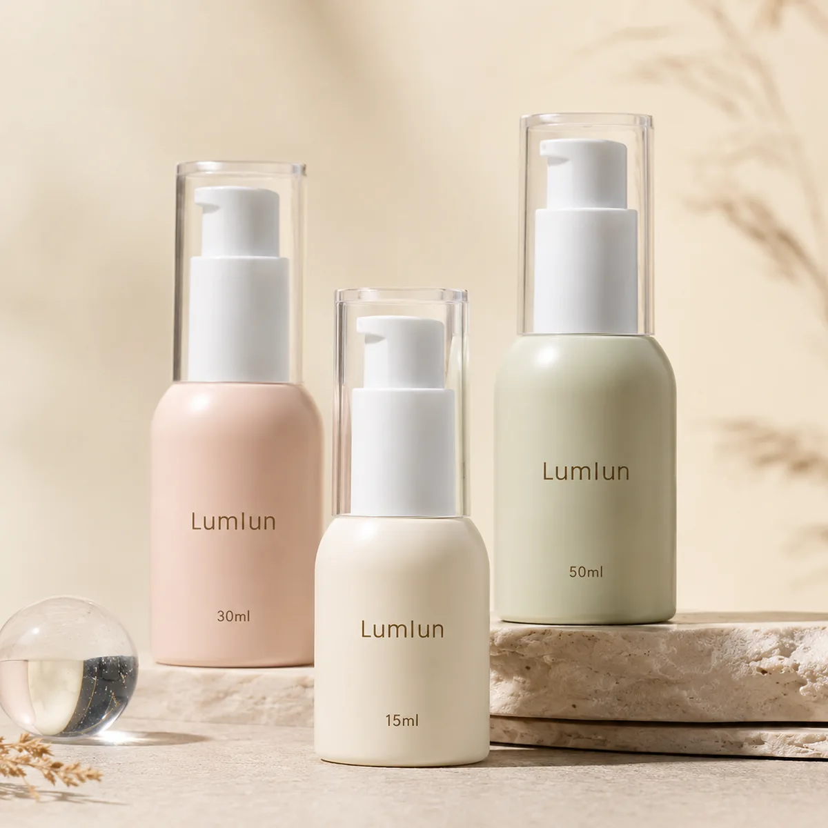 Three PP airless pump bottles for serum and lotion in 15ml 30ml and 50ml pastel color