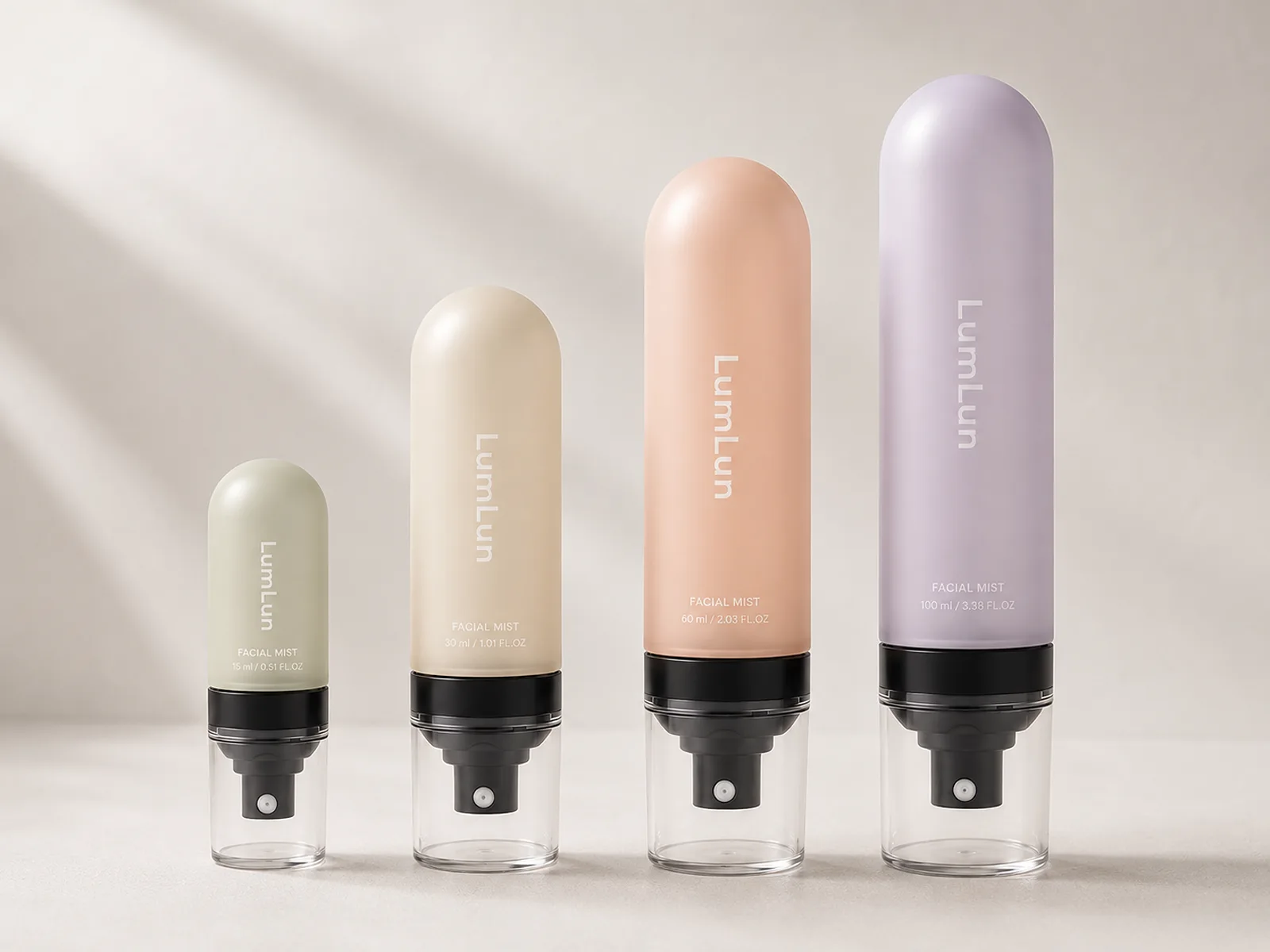 Four LumLun facial mist bottles in 15ml, 30ml, 60ml and 100ml sizes with sage, cream, peach and lavender finishes