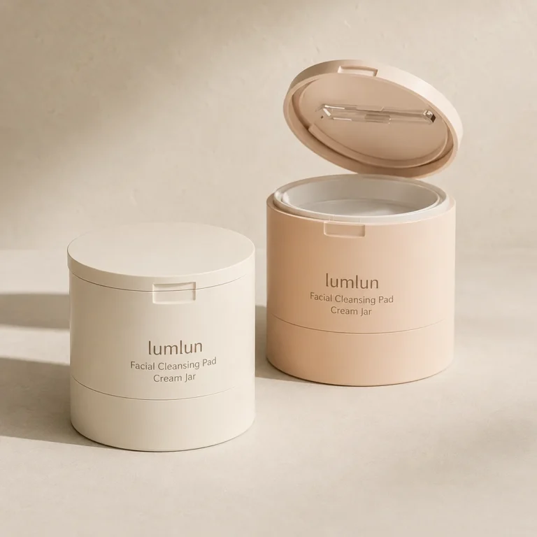 Cream and peach Lumlun toner pad jars displayed together, one closed and one open.