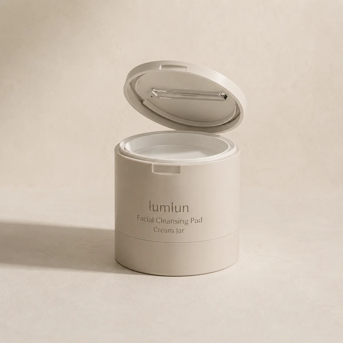 Beige Lumlun toner pad jar shown open with a flip-top lid and built-in tweezer holder.