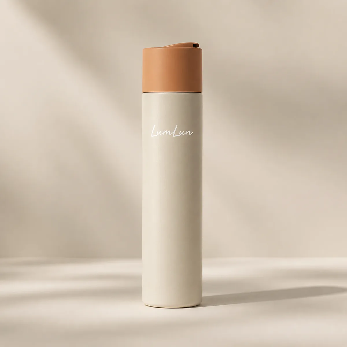 Single cream Lumlun disc top lotion bottle with an orange cap on a minimal warm background.