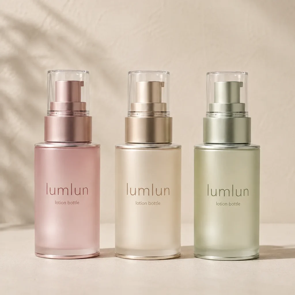 Three Lumlun lotion bottles in pink, beige, and green with clear caps and matching pumps.