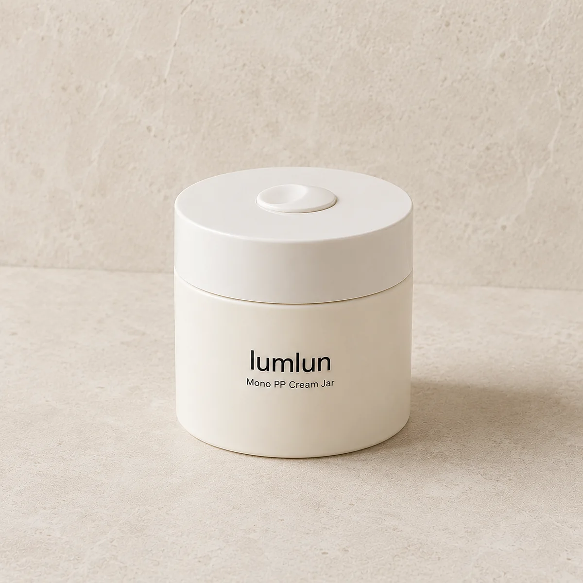 Single white Lumlun Mono PP cream jar shown closed on a neutral textured background.