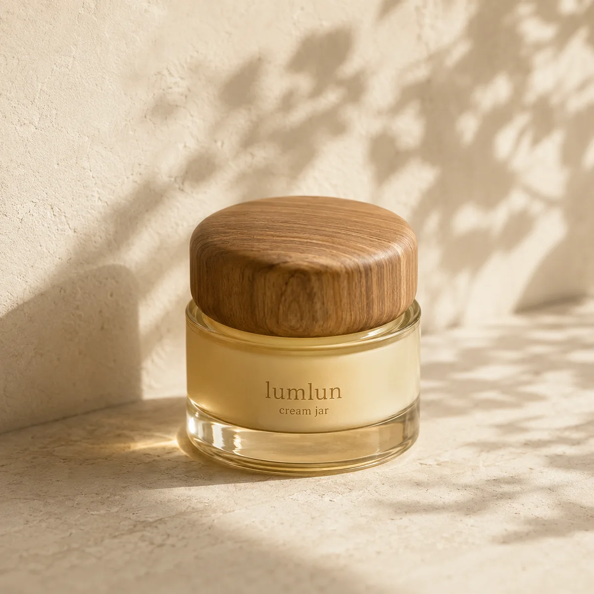 Lumlun glass cream jar with a natural wood lid and warm yellow tinted glass body.