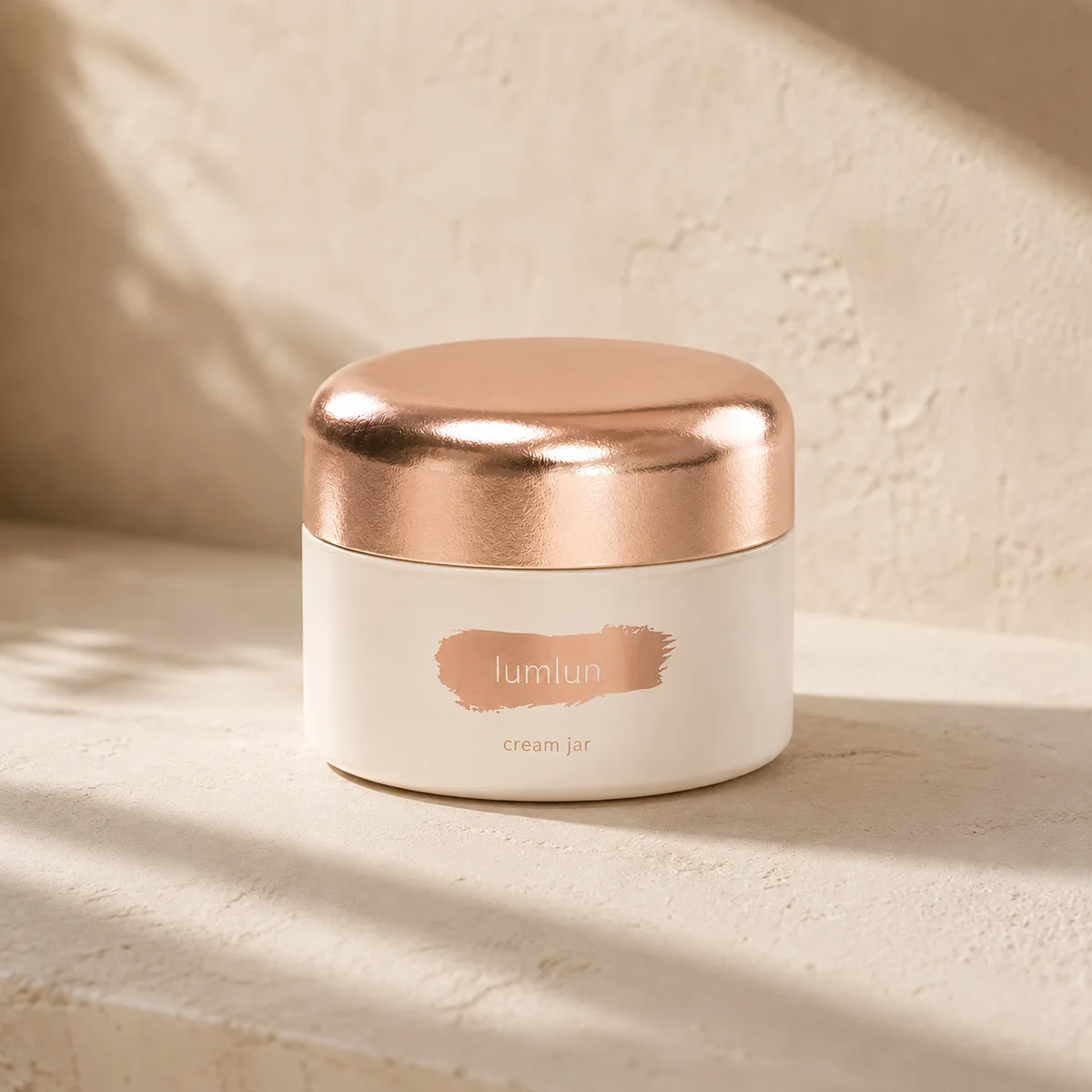 Lumlun 30ml 50ml glass cream jar with a rose gold metallic lid and cream white body.