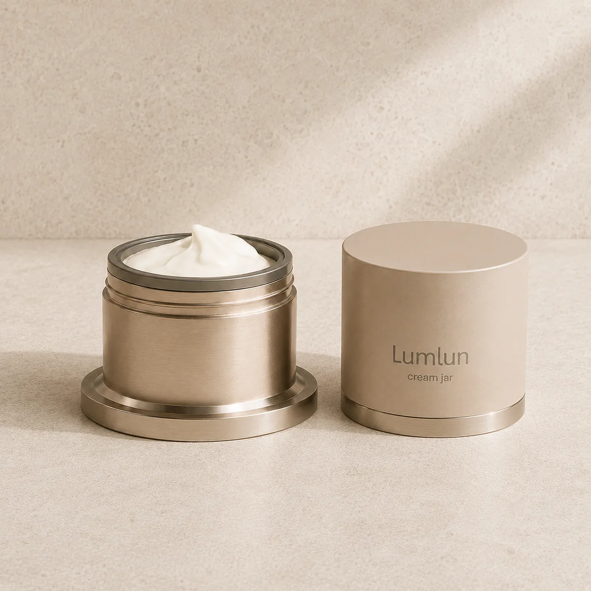 Beige Lumlun cream jar displayed beside an open metallic refillable jar filled with cream.