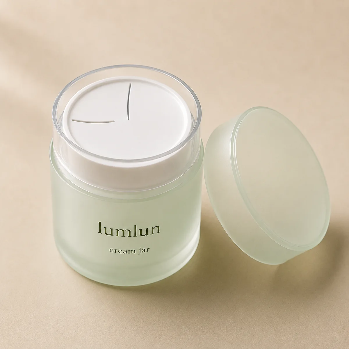 Lumlun 45g PP grinding cream jar in green with the side lid removed to show the top disk.