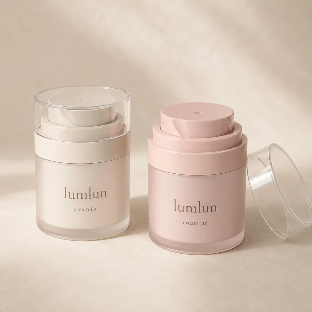Two Lumlun 50g twist pod cream jars, one ivory and one pink, with a clear cap beside them.