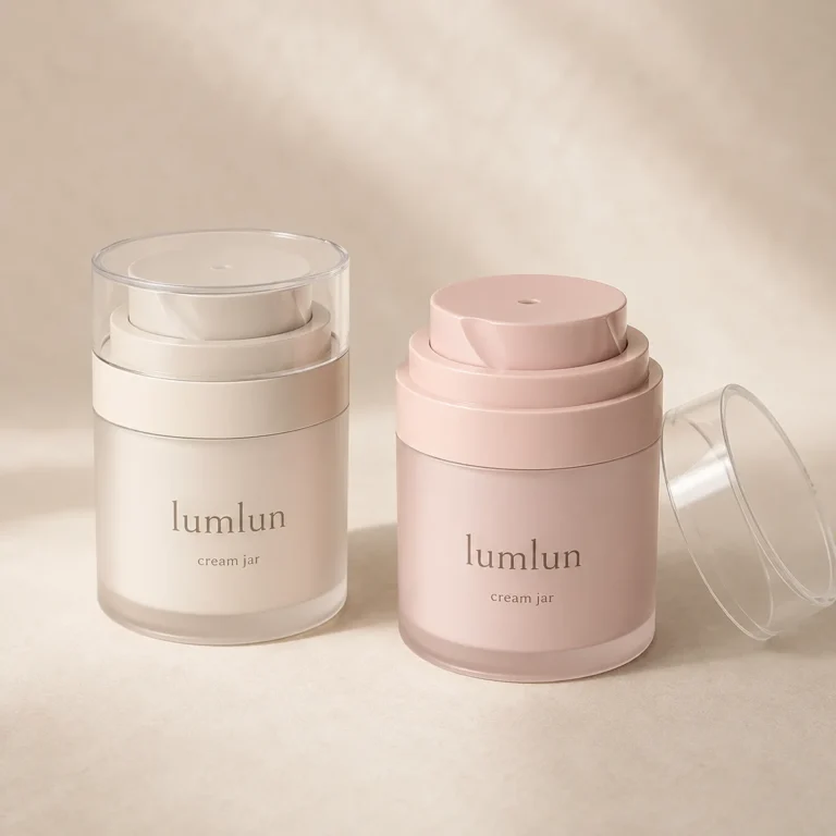 Two Lumlun 50g twist pod cream jars, one ivory and one pink, with a clear cap beside them.