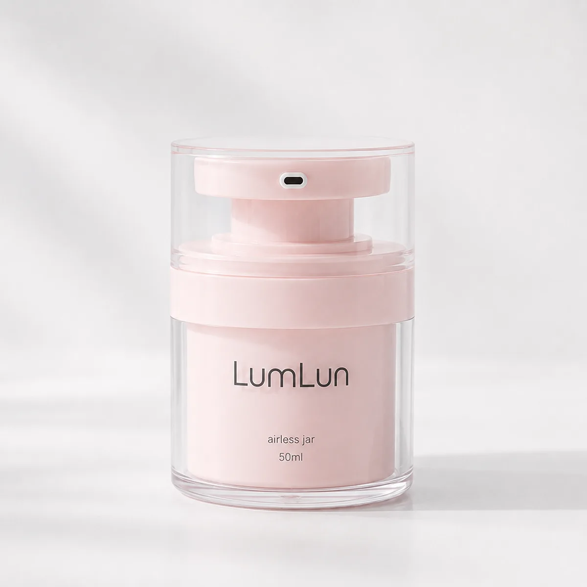 Lumlun 50ml clear AS airless cream jar with a soft pink inner cup and clear outer shell.