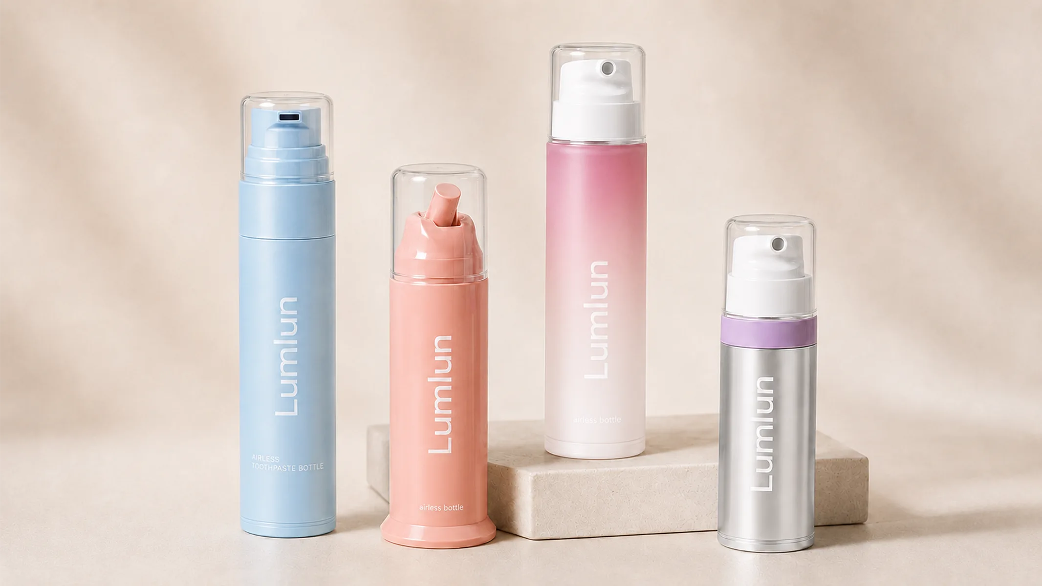 LumLun custom airless toothpaste pump bottles showing blue coral pink and metallic finish options