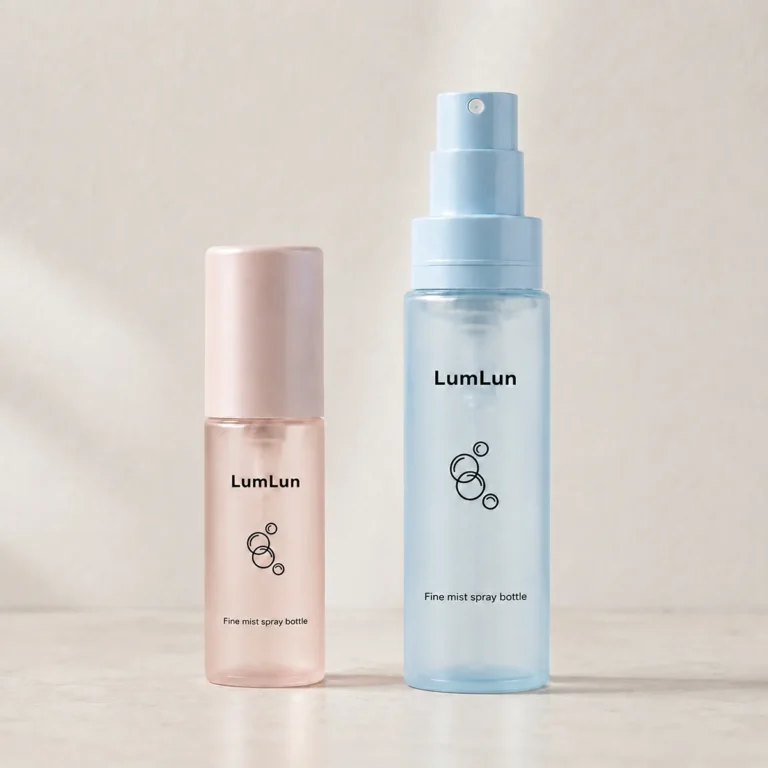 Two Lumlun fine mist spray bottles in pink and blue, showing capped and open pump styles.