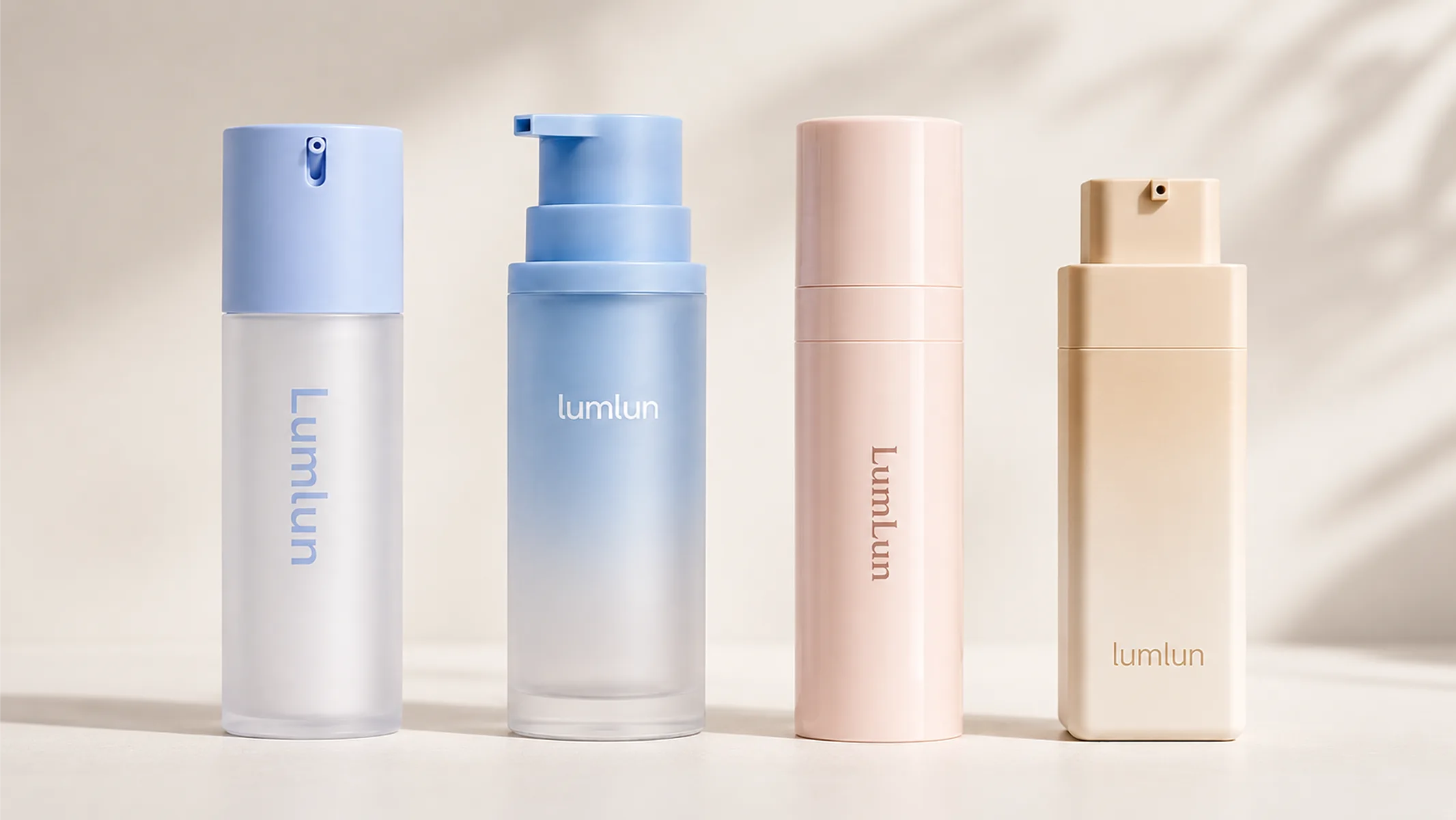 Four Lumlun airless bottles comparing matte, frosted, glossy, and soft-touch cosmetic packaging finishes