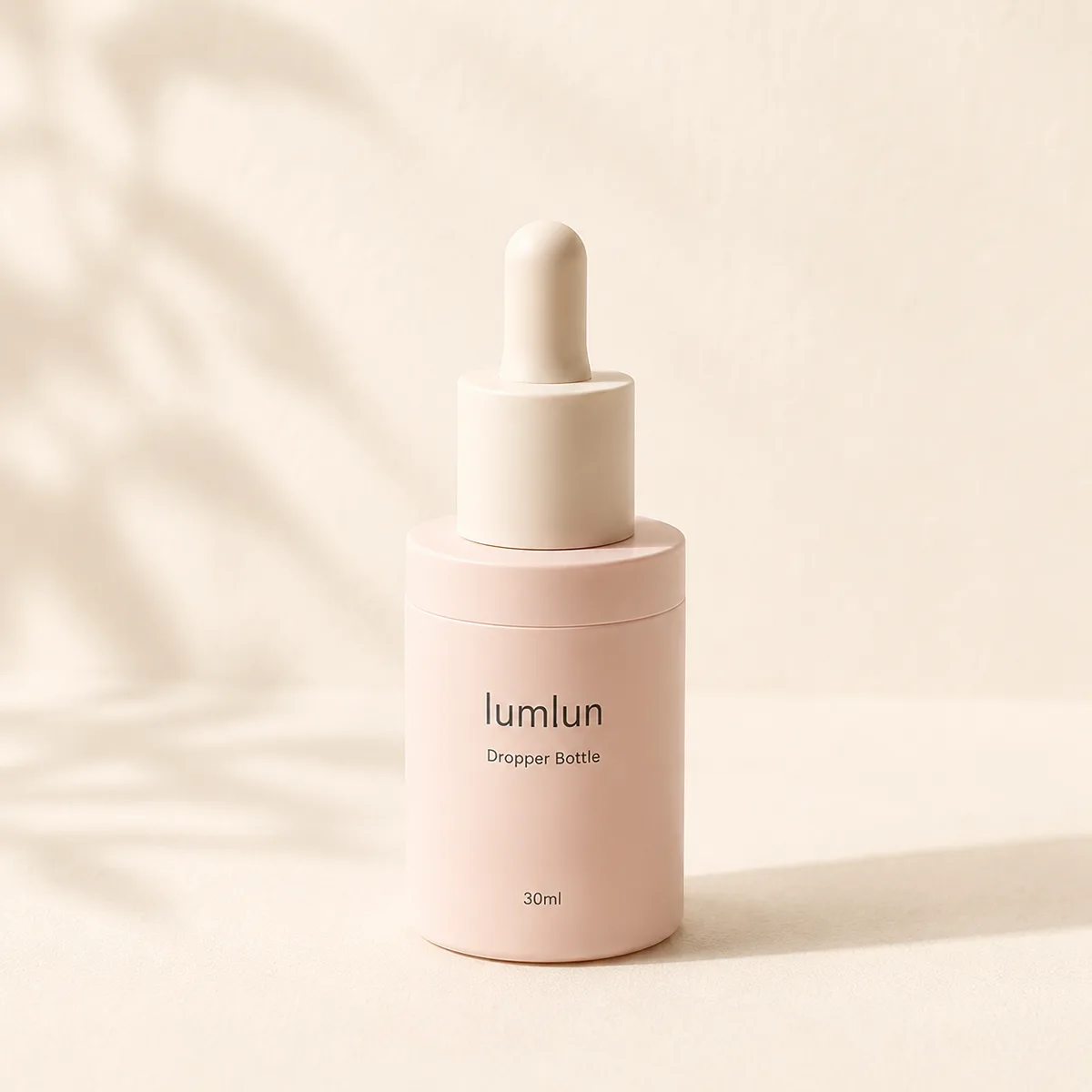 LumLun single pink 30ml dropper bottle centered in minimal soft studio lighting composition