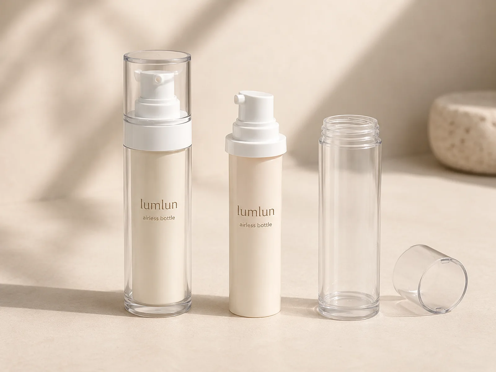 LumLun refillable airless bottle system with an assembled bottle, replaceable inner bottle, outer shell, and cap