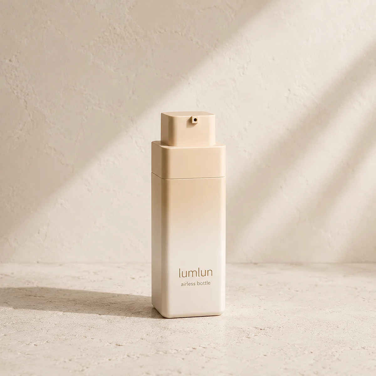Lumlun square replaceable airless bottle in cream with a visible side-nozzle press head.