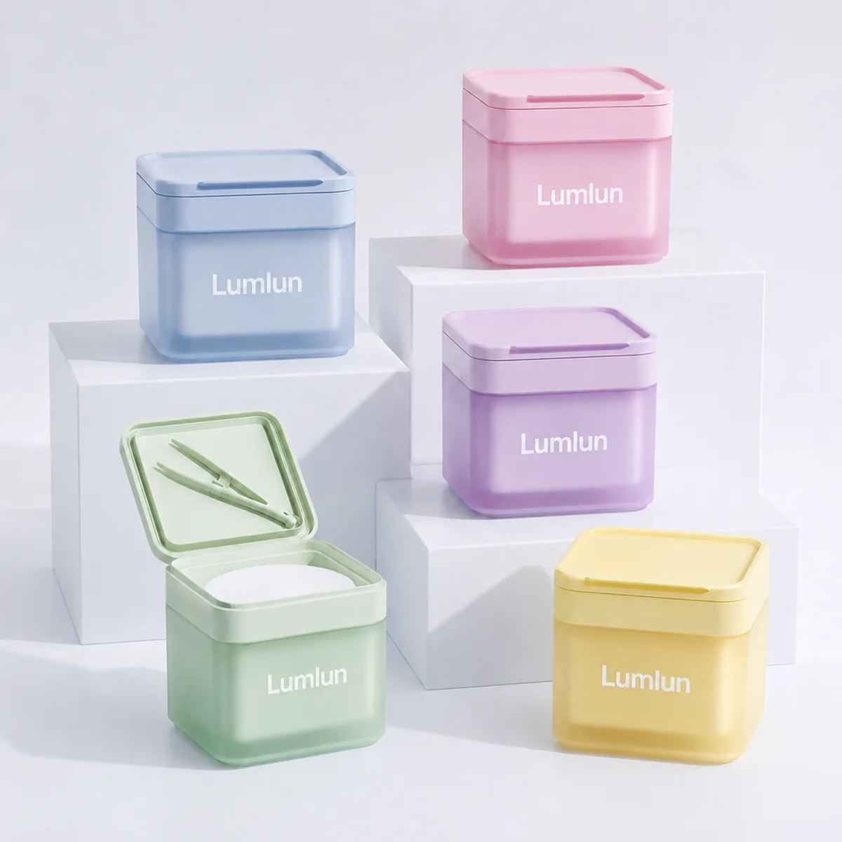 LumLun square PP toner pad jars in pastel colors, including an open flip-top jar with optional lid-mounted tweezers and visible toner pads