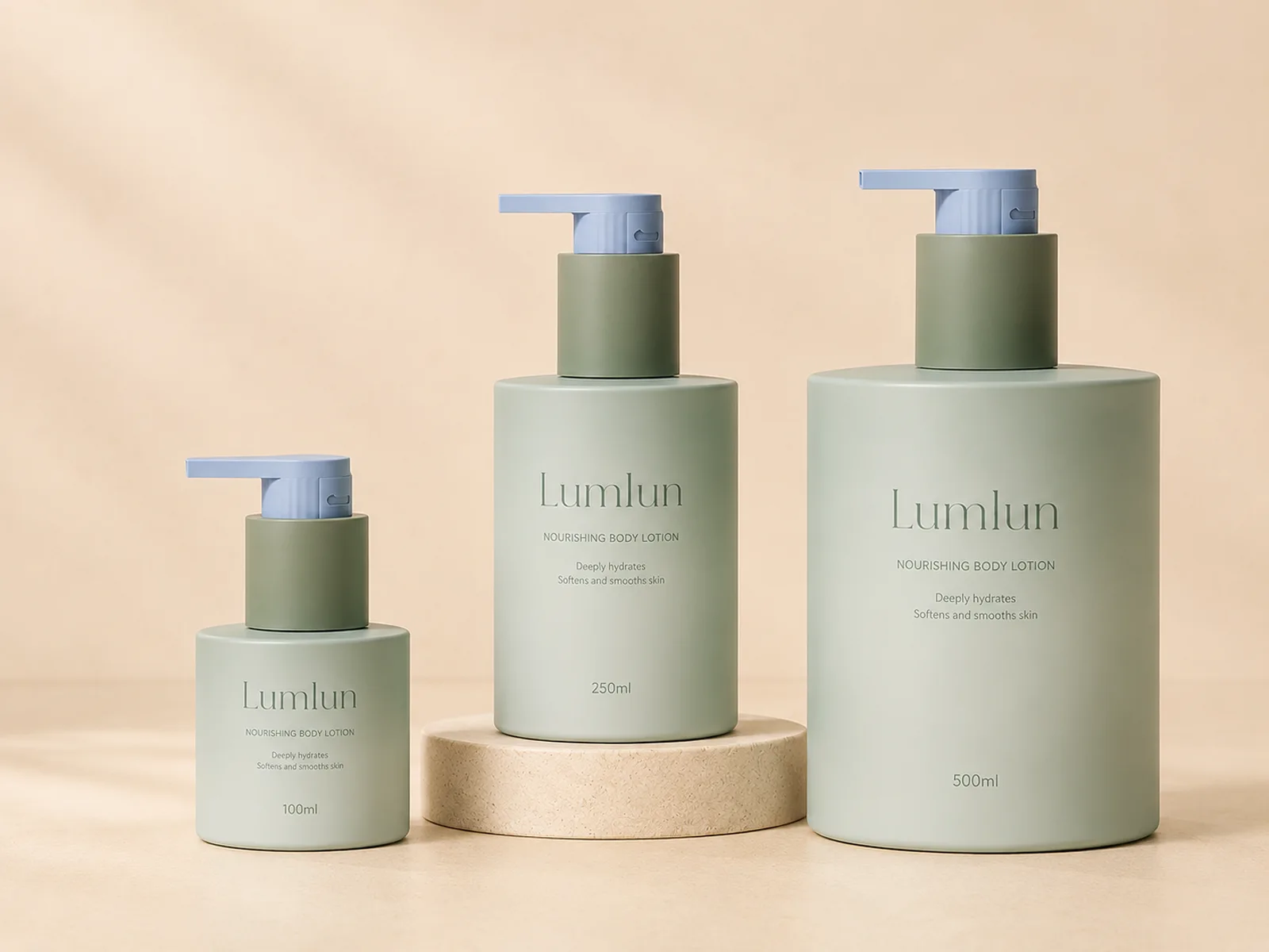 Three sage green LumLun body lotion pump bottles labeled 100ml, 250ml and 500ml in a coordinated size range