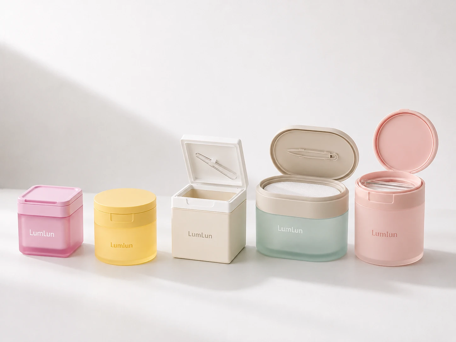 Five LumLun toner pad jars in different sizes and shapes, including open designs with tweezers