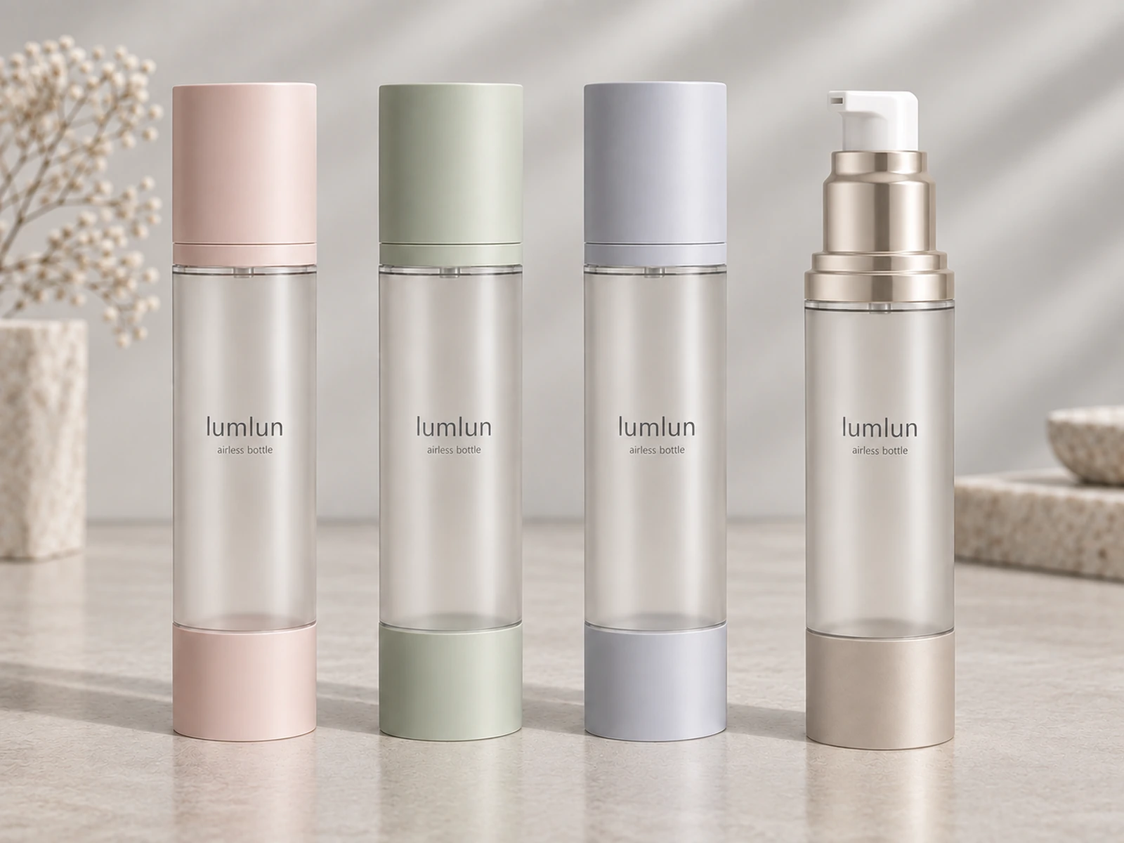 Three LumLun airless bottles using the same structure in different colors beside a structurally different pump bottle