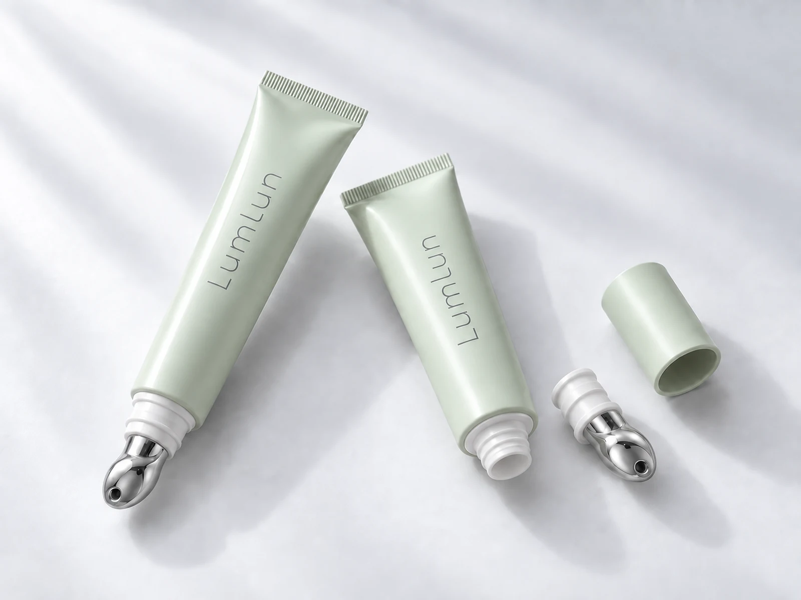 Tubos para cuidado labial LumLun con extremos previamente sellados y aplicador metálico desmontable para llenado por la cabeza