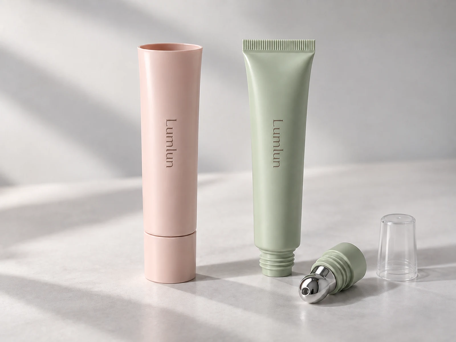 Tubos cosméticos LumLun con un tubo de extremo abierto y un tubo con aplicador previamente sellado para dos rutas de llenado