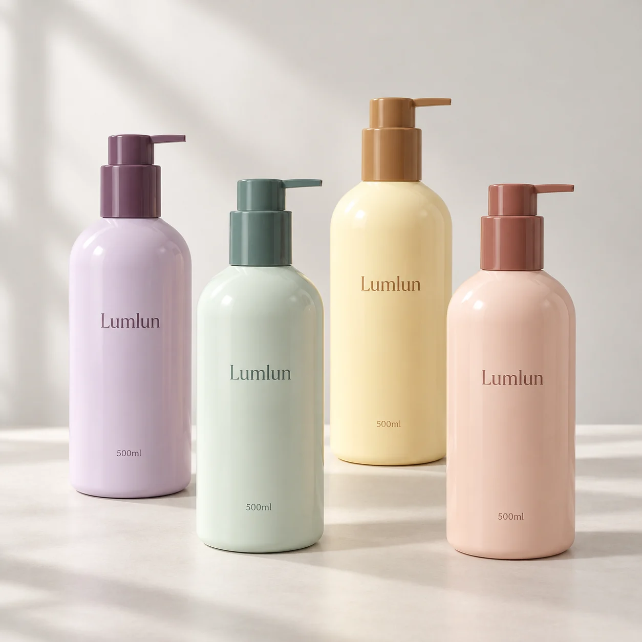 Four 500ml PET lotion pump bottles in lavender, green, yellow and pink