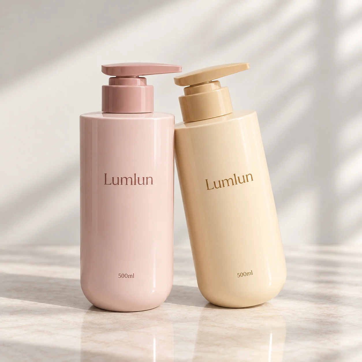 Two PET shampoo pump bottles in pink and cream-yellow