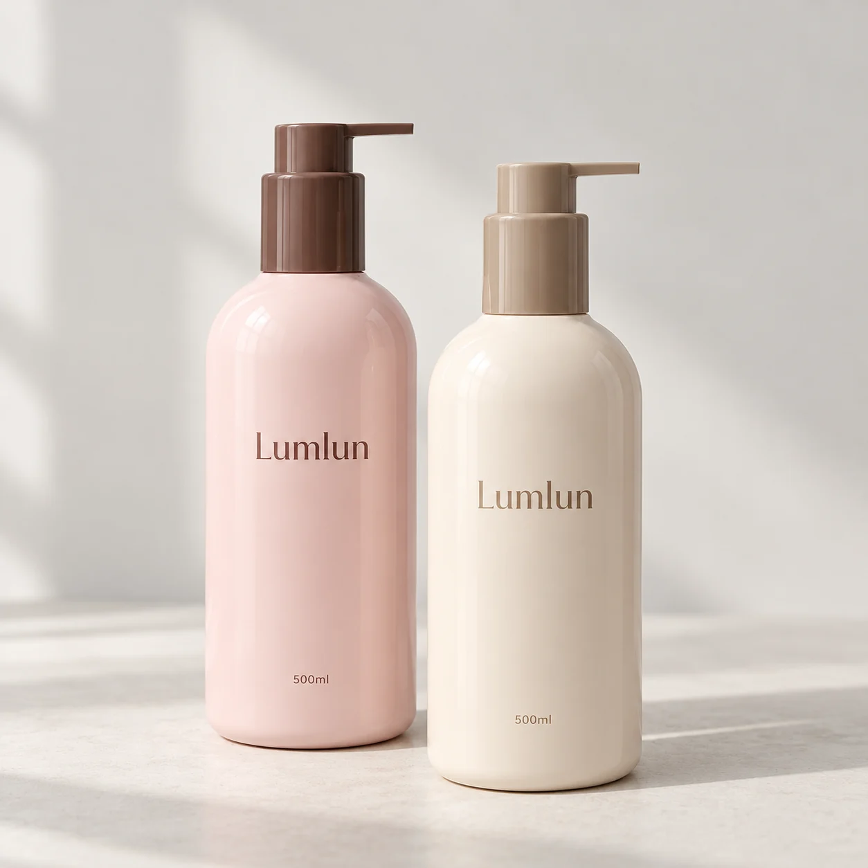 Pink and cream PET pump bottles with tall slim silhouettes